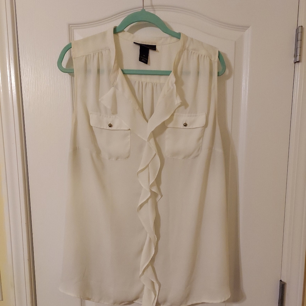 Off-white sleeveless blouse